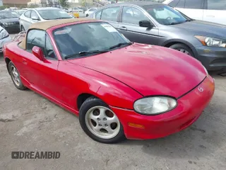 1999 Mazda MX-5 Miata z VIN JM1NB3532X0113205, wystawiony jako IAAI lot #41981635 z przebiegiem 111 544 mil mil oraz . Historia ofert i sprzedaży dostępna na DreamBid. Obrazek 1.