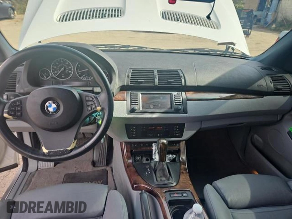 2006 BMW X5 4.4i with VIN 5UXFB53556LV26283, listed as a Copart auction lot 79714584 with 77,033 mi miles and Clean Title. Bid and sale history available at carsss.com. Image 9.