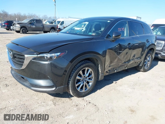 2016 Mazda CX-9 Sport with VIN JM3TCBBY8G0118088, listed as a IAAI auction lot 41710275 with 128,400 mi miles. Bid and sale history available at carsss.com. Image 2.