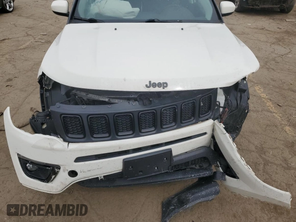 2019 Jeep Compass Altitude with VIN 3C4NJCBB4KT618673, listed as a Copart auction lot 51801955 with 104,784 mi miles and Salvage title. Bid and sale history available at DreamBid. Image 13.