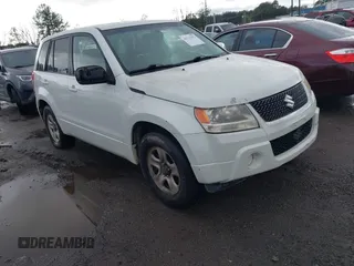 2009 Suzuki Grand Vitara z VIN JS3TE042X94100012, wystawiony jako IAAI lot #41713352 z przebiegiem 214 295 mil mil oraz . Historia ofert i sprzedaży dostępna na DreamBid. Obrazek 1.