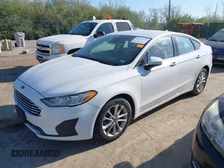 2019 Ford Fusion SE with VIN 3FA6P0HD6KR265995, listed as a IAAI auction lot 42097079 with 112,713 mi miles. Bid and sale history available at carsss.com. Image 16.