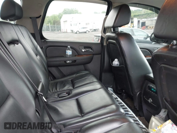 2007 GMC Yukon SLT z VIN 1GKFK13057R336128, wystawiony jako IAAI lot #42301778 z przebiegiem 153 227 mil mil oraz . Historia ofert i sprzedaży dostępna na DreamBid. Obrazek 8.