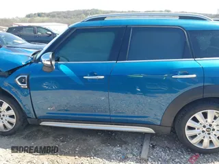 2018 MINI Countryman Cooper S with VIN WMZYT5C30J3E60548, listed as a IAAI auction lot 41890016 with 75,769 mi miles and . Bid and sale history available at DreamBid. Image 14.