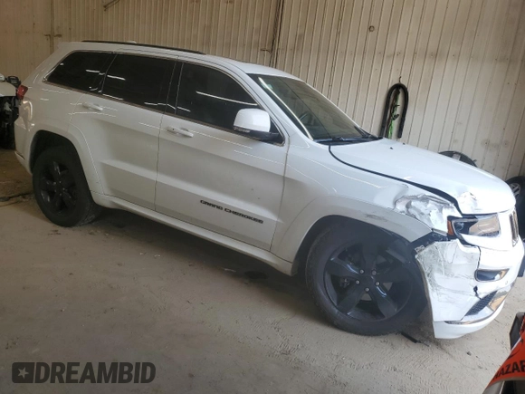 2015 Jeep Grand Cherokee High Altitude with VIN 1C4RJFCG8FC198172, listed as a Copart auction lot 60542165 with 137,313 mi miles and Salvage title. Bid and sale history available at DreamBid. Image 4.