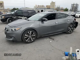 2018 Nissan Maxima SV with VIN 1N4AA6AP6JC384520, listed as a Copart auction lot 58026545 with 157,005 mi miles and Salvage title. Bid and sale history available at DreamBid. Image 1.