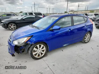 2012 Hyundai Accent SE with VIN KMHCU5AE2CU038265, listed as a Copart auction lot 64029585 with 170,592 mi miles and Salvage title. Bid and sale history available at DreamBid. Image 1.