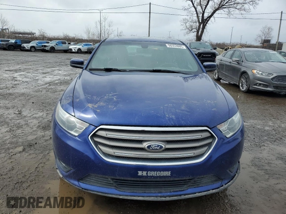 2013 Ford Taurus SEL with VIN 1FAHP2H80DG115530, listed as a Copart auction lot 50353005 with 194,515 mi miles and Salvage Title. Bid and sale history available at DreamBid. Image 5.