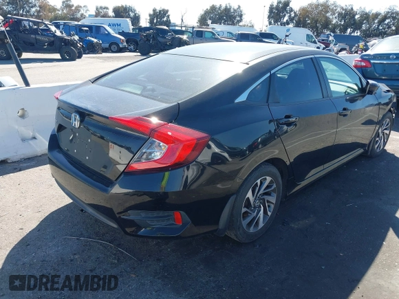 2016 Honda Civic EX with VIN 19XFC2F71GE023712, listed as a IAAI auction lot 41824595 with 87,127 mi miles and . Bid and sale history available at DreamBid. Image 4.