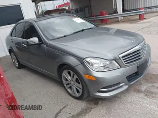 2013 Mercedes-Benz C C 250 Sport with VIN WDDGF4HB3DR243125, listed as a IAAI auction lot 42143454 with 122,462 mi miles. Bid and sale history available at carsss.com. Image 1.