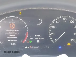 2022 Honda Civic Sport z VIN 2HGFE2F54NH599290, wystawiony jako IAAI lot #42212435 z przebiegiem 49 012 mil mil oraz . Historia ofert i sprzedaży dostępna na DreamBid. Obrazek 7.