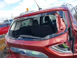 2015 Ford Escape Titanium with VIN 1FMCU0JX8FUA89049, listed as a IAAI auction lot 41988611 with 277,003 mi miles. Bid and sale history available at carsss.com. Image 6.
