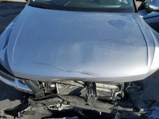 2021 Volkswagen Tiguan S with VIN 3VV1B7AX7MM005980, listed as a Copart auction lot 42827715 with 34,940 mi miles and Salvage Title. Bid and sale history available at carsss.com. Image 13.