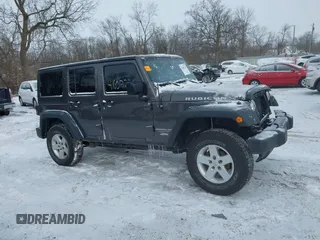 2016 Jeep Wrangler Unlimited Rubicon with VIN 1C4BJWFG7GL192698, listed as a IAAI auction lot 41603236 with 69,620 mi miles. Bid and sale history available at carsss.com. Image 13.