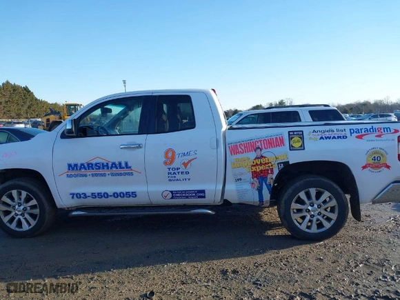 2014 Toyota Tundra 4WD Truck LTD with VIN 5TFBY5F14EX355878, listed as a IAAI auction lot 41500114 with 256,096 mi miles. Bid and sale history available at carsss.com. Image 14.