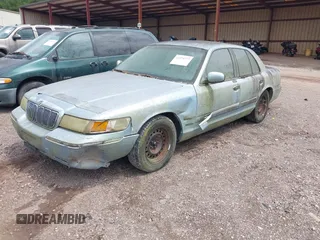 1999 Mercury Grand Marquis GS z VIN 2MEFM74W8XX686921, wystawiony jako IAAI lot #42374777 z przebiegiem 185 166 mil mil oraz . Historia ofert i sprzedaży dostępna na DreamBid. Obrazek 2.