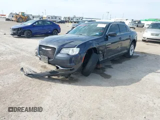 2016 Chrysler 300 Limited with VIN 2C3CCAAG7GH243188, listed as a IAAI auction lot 41888390 with 105,057 mi miles and . Bid and sale history available at carsss.com. Image 2.