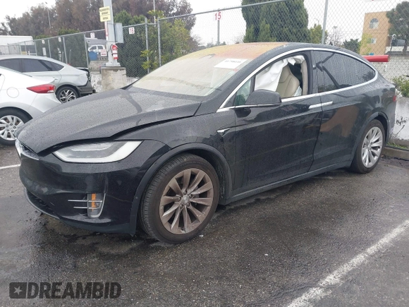 2018 Tesla Model X 75D with VIN 5YJXCBE25JF117801, listed as a IAAI auction lot 41798116 with 95,253 mi miles. Bid and sale history available at carsss.com. Image 2.