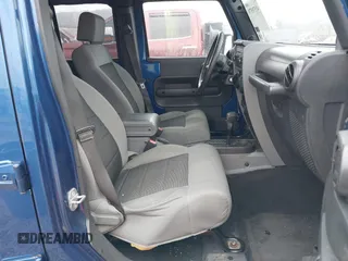 2009 Jeep Wrangler Unlimited X with VIN 1J4GA39189L787777, listed as a IAAI auction lot 41570579 with 193,163 mi miles. Bid and sale history available at carsss.com. Image 5.