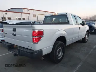 2013 Ford F-150 XL with VIN 1FTFX1CF0DKF21158, listed as a IAAI auction lot 41830271 with 311,990 mi miles and . Bid and sale history available at DreamBid. Image 4.