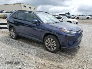 2022 Toyota RAV4 XLE Premium with VIN JTMC1RFV7ND087414, listed as a Copart auction lot 60844905 with 90,232 mi miles and Salvage title. Bid and sale history available at DreamBid. Image 4.