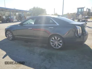 2014 Cadillac CTS Premium AWD with VIN 1G6AZ5S34E0123356, listed as a Copart auction lot 69327504 with 136,292 mi miles and Salvage Title. Bid and sale history available at DreamBid. Image 2.