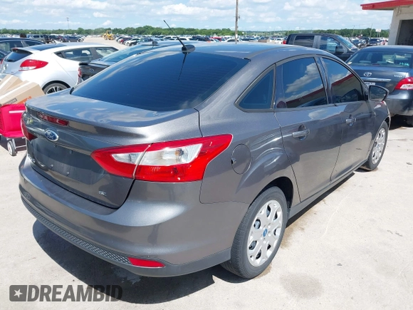 2012 Ford Focus SE with VIN 1FAHP3F28CL211898, listed as a IAAI auction lot 42466544 with 142,933 mi miles and . Bid and sale history available at DreamBid. Image 4.