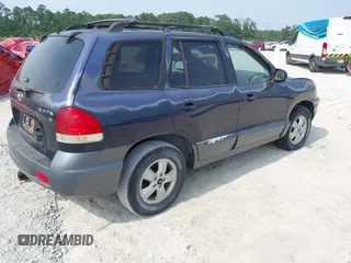 2005 Hyundai Santa Fe GLS with VIN KM8SC13D55U914499, listed as a IAAI auction lot 42587492 with 198,141 mi miles and . Bid and sale history available at DreamBid. Image 4.