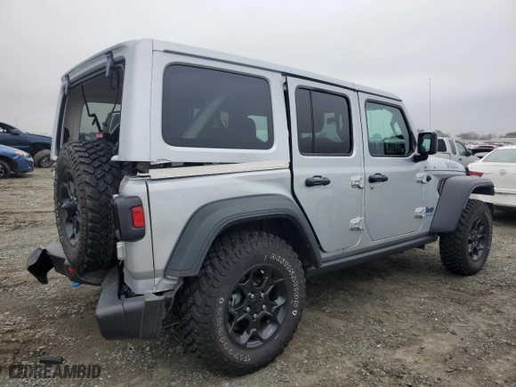 2023 Jeep Wrangler 4xe with VIN 1C4JJXN6XPW613161, listed as a Copart auction lot 85817424 with 11,957 mi miles and Salvage Title. Bid and sale history available at carsss.com. Image 3.