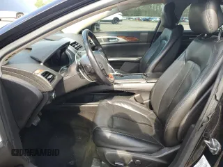 2013 Lincoln MKZ z VIN 3LN6L2GK5DR823755, wystawiony jako Copart lot #53060295 z przebiegiem 145 624 mil mil oraz Szkoda całkowita • Salvage title. Historia ofert i sprzedaży dostępna na DreamBid. Obrazek 7.