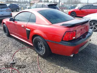 2001 Ford Mustang GT Deluxe with VIN 1FAFP42X11F255588, listed as a IAAI auction lot 41613207 with 203,244 mi miles. Bid and sale history available at carsss.com. Image 3.