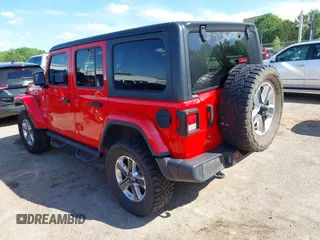 2019 Jeep Wrangler Unlimited Sahara with VIN 1C4HJXEG7KW551864, listed as a IAAI auction lot 42170875 with 115,695 mi miles and . Bid and sale history available at DreamBid. Image 3.