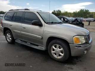 2003 GMC Envoy SLT with VIN 1GKDT13SX32281667, listed as a Copart auction lot 66211344 with 228,312 mi miles and Clean Title. Bid and sale history available at carsss.com. Image 4.