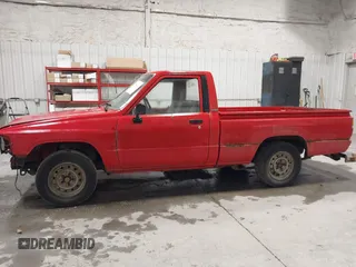 1987 Toyota Pickup with VIN JT4RN50R8H0221202, listed as a IAAI auction lot 40500429 with 304,229 mi miles and . Bid and sale history available at DreamBid. Image 14.
