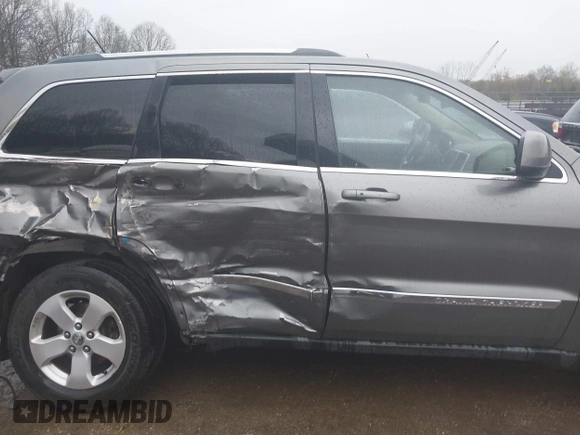 2012 Jeep Grand Cherokee Laredo with VIN 1C4RJFAG0CC156545, listed as a IAAI auction lot 41909296 with 170,033 mi miles. Bid and sale history available at carsss.com. Image 13.