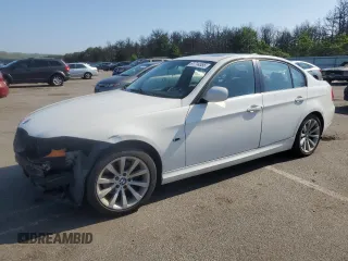 2009 BMW 3 Series 328i with VIN WBAPH57529NL79831, listed as a Copart auction lot 61714555 with 160,714 mi miles and Salvage title. Bid and sale history available at DreamBid. Image 1.