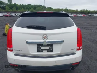 2013 Cadillac SRX Performance Collection with VIN 3GYFNHE34DS628486, listed as a IAAI auction lot 42530124 with 76,778 mi miles and . Bid and sale history available at DreamBid. Image 16.