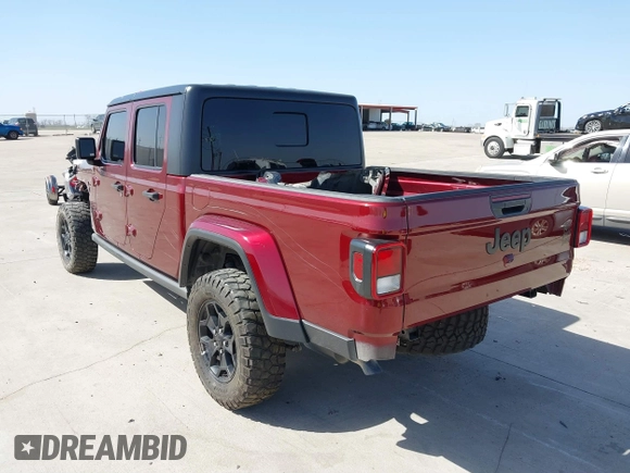 2021 Jeep Gladiator Willys z VIN 1C6HJTAG0ML536455, wystawiony jako IAAI lot #41702393 z przebiegiem 90 644 mil mil oraz . Historia ofert i sprzedaży dostępna na DreamBid. Obrazek 3.