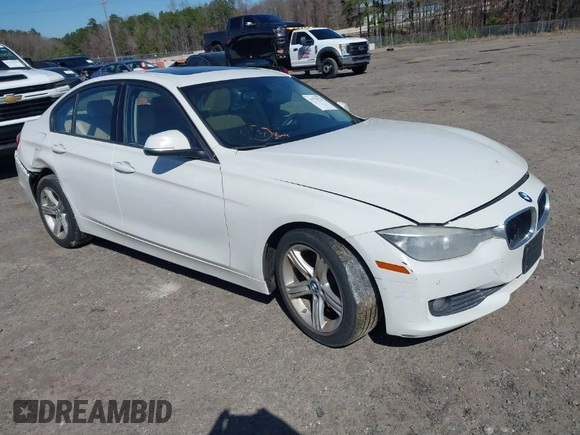 2014 BMW 3 Series 320i with VIN WBA3B1C59EP678908, listed as a IAAI auction lot 41774738 with 143,975 mi miles. Bid and sale history available at carsss.com. Image 1.