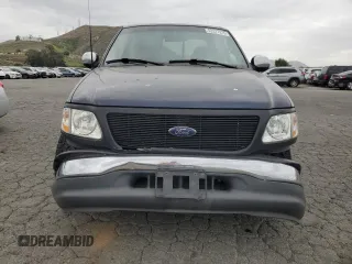 2000 Ford F-150 XL with VIN 1FTZX1721YKB14556, listed as a Copart auction lot 53227925 with 0 mi miles and Salvage Title. Bid and sale history available at carsss.com. Image 5.