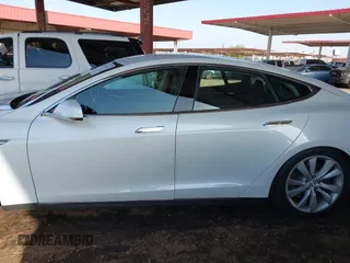 2014 Tesla Model S 60 with VIN 5YJSA1H14EFP63737, listed as a IAAI auction lot 41947610 with 62,240 mi miles and . Bid and sale history available at DreamBid. Image 14.