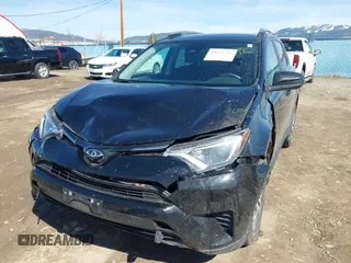 2017 Toyota RAV4 LE with VIN 2T3BFREV2HW543163, listed as a IAAI auction lot 41875755 with 96,398 mi miles and . Bid and sale history available at carsss.com. Image 6.