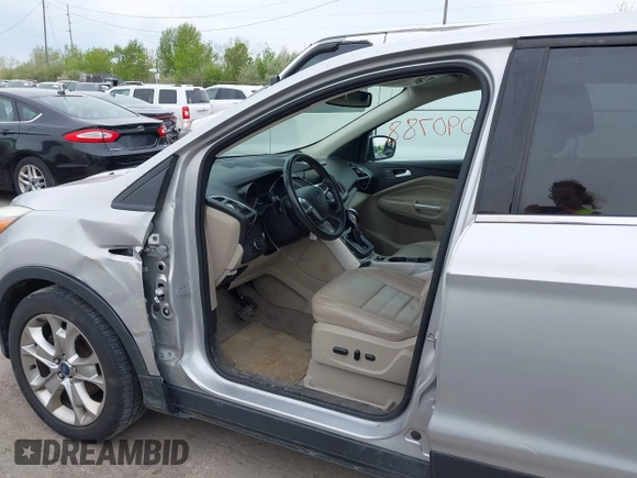 2013 Ford Escape SEL with VIN 1FMCU0HX1DUB81641, listed as a IAAI auction lot 42090788 with 111,496 mi miles and . Bid and sale history available at DreamBid. Image 6.
