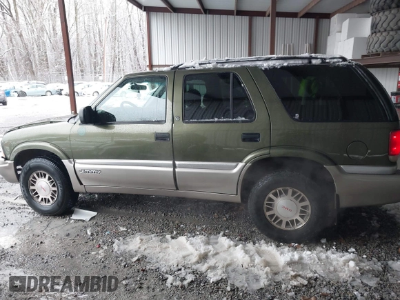 2001 GMC Jimmy SLE with VIN 1GKDT13W212171101, listed as a IAAI auction lot 41546523 with 229,471 mi miles. Bid and sale history available at carsss.com. Image 14.