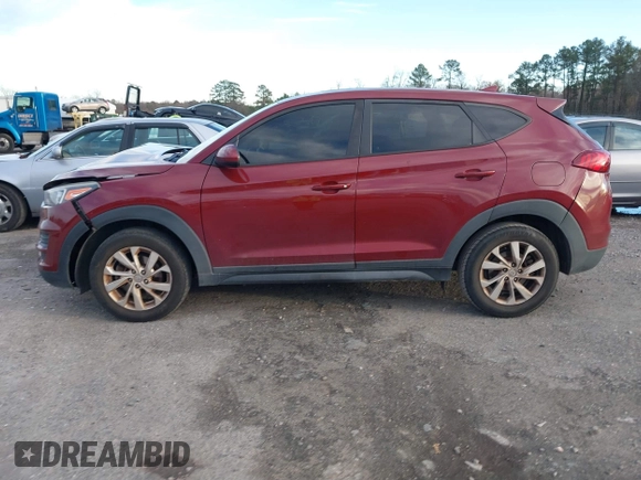 2019 Hyundai Tucson SE with VIN KM8J2CA49KU881841, listed as a IAAI auction lot 41099575 with 129,153 mi miles. Bid and sale history available at carsss.com. Image 14.