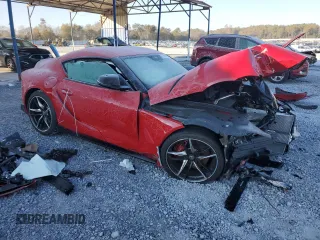 2021 Toyota Supra 3.0 z VIN WZ1DB0C04MW041937, wystawiony jako Copart lot #58712405 z przebiegiem Nie podano mil oraz Szkody całkowita. Historia ofert i sprzedaży dostępna na DreamBid. Obrazek 4.