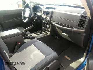 2010 Jeep Liberty Sport with VIN 1J4PN2GK3AW109144, listed as a IAAI auction lot 42135585 with 121,740 mi miles. Bid and sale history available at carsss.com. Image 5.