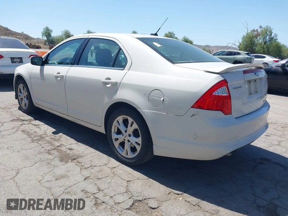 2012 Ford Fusion SE z VIN 3FAHP0HG1CR439198, wystawiony jako IAAI lot #42272610 z przebiegiem 151 249 mil mil oraz . Historia ofert i sprzedaży dostępna na DreamBid. Obrazek 3.