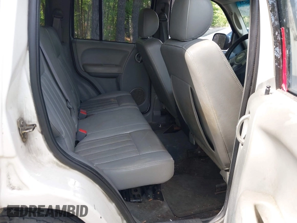 2006 Jeep Liberty Limited with VIN 1J4GL58K06W210025, listed as a IAAI auction lot 42189823 with 211,182 mi miles. Bid and sale history available at carsss.com. Image 8.