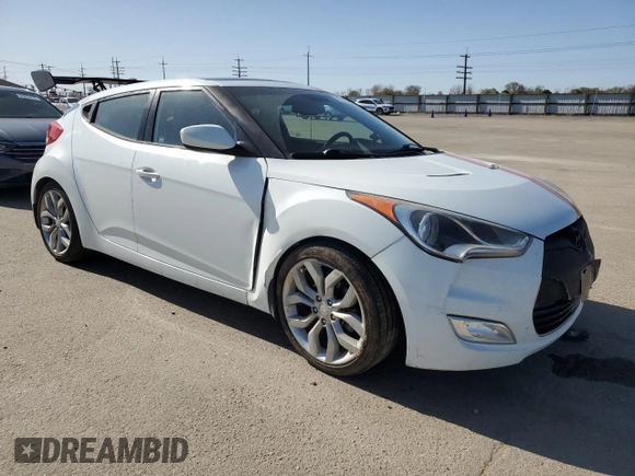 2013 Hyundai Veloster w/Gray Int z VIN KMHTC6ADXDU127194, wystawiony jako Copart lot #51751345 z przebiegiem 122 221 mil mil oraz Szkoda całkowita • Salvage title. Historia ofert i sprzedaży dostępna na DreamBid. Obrazek 4.
